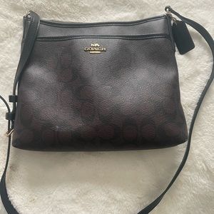 Black coach monogram messenger bag